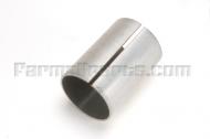 There are two upper bolster bushings, a top one and a lower one.  This bushing is the top one and it is on the vertical steering shaft, below the worm gear.